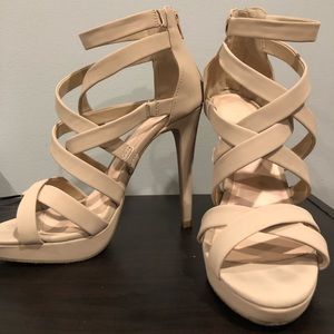 Women’s tan strapped heals